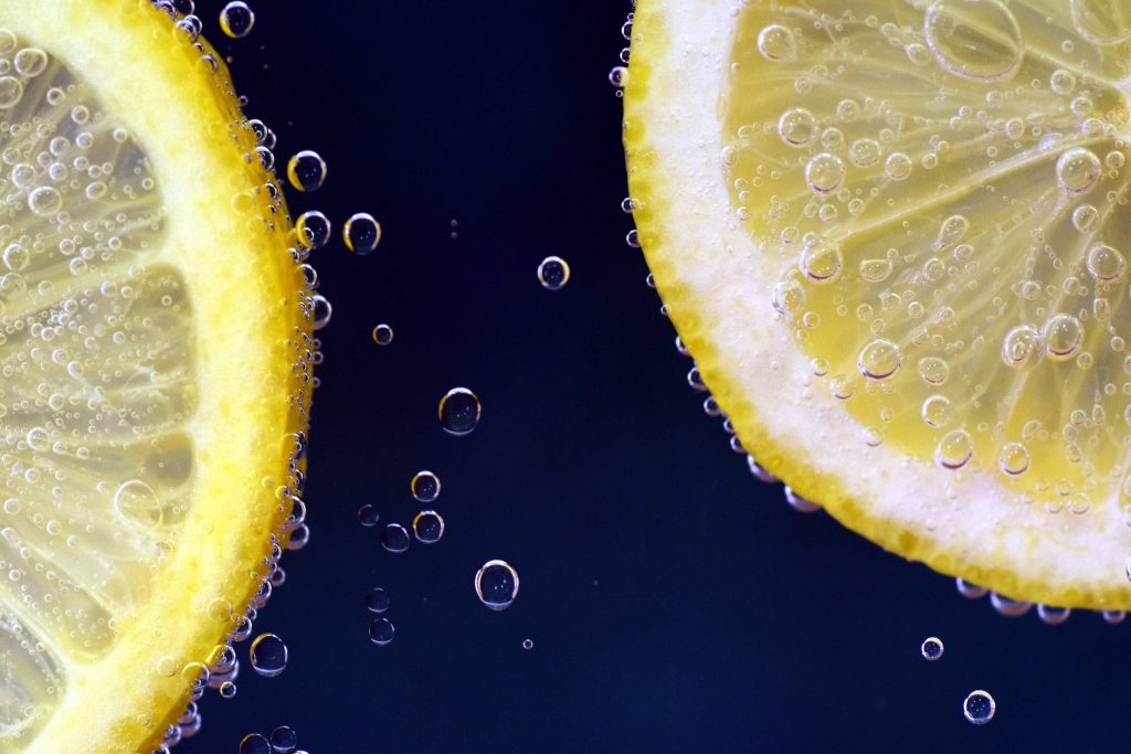 Two lemon slices in water.