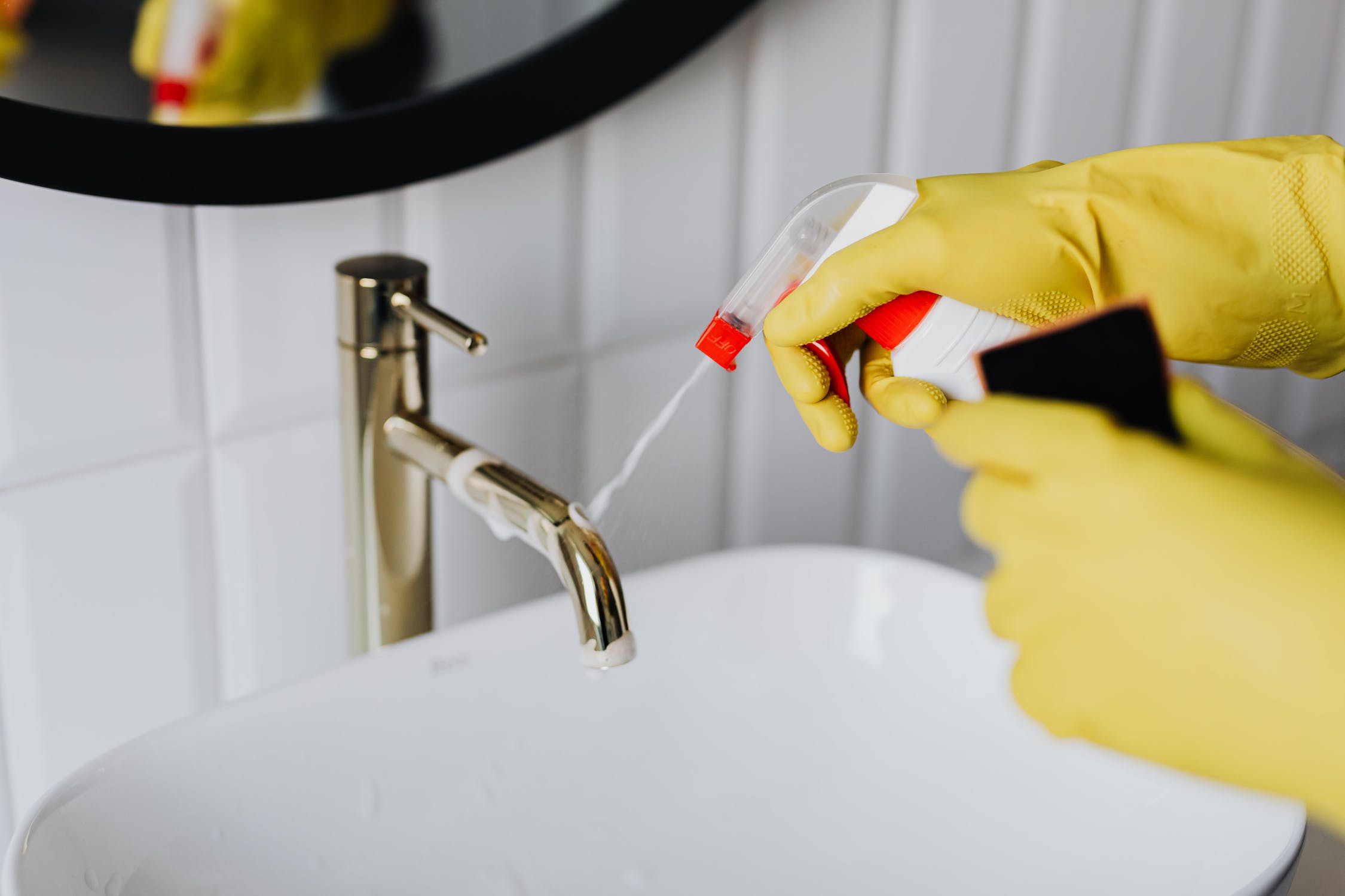 Spraying a sink tap